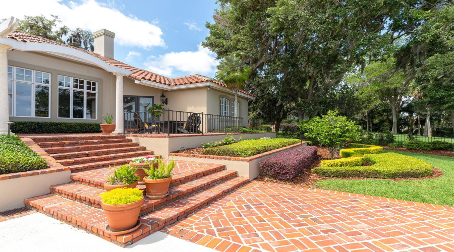 Generous Use Of St. Louis Brick, Wood Flooring, And Wrought Iron Artistry.