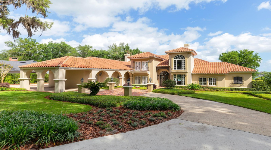 Biltmore Gas Lanterns, Shutters, Balconies &Amp; Towering Tree Canopies As You Approach This Mediterranean-Riviera Style Estate.