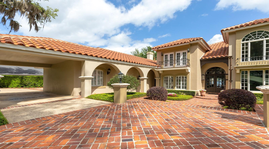 Elegant Entry Features Include Porte-Cochere.