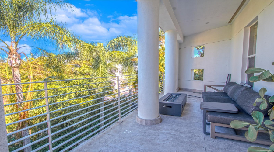 Balcony Off Primary Overlooking Pool.