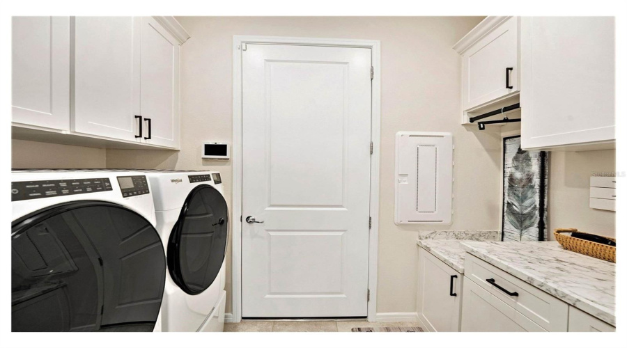 Beautifully Finished Laundry Room. Do Notice The &Quot;Smart Hub&Quot; Next To The Door. Not Sure What It Is? Call Me