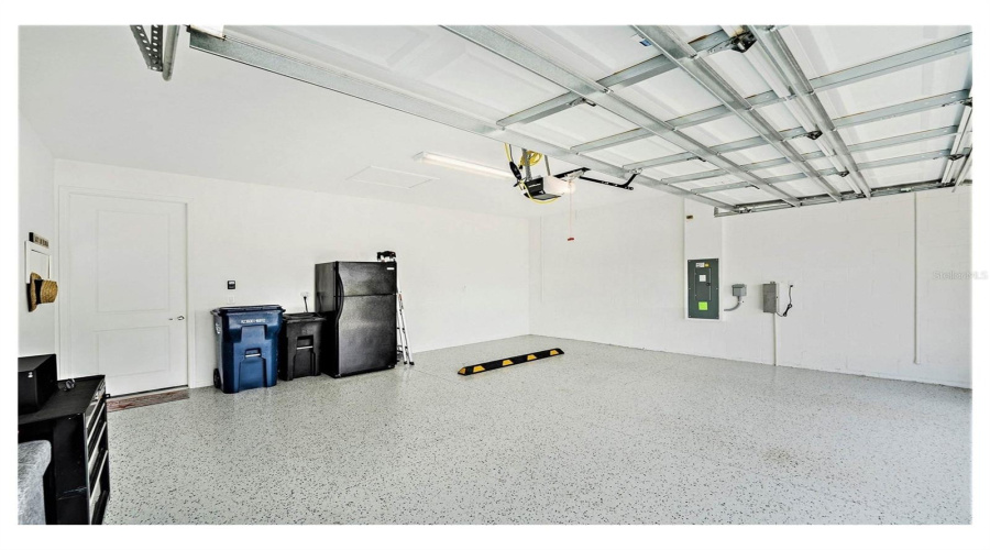 Two Car Garage With Epoxy Floor And An Ev Charger