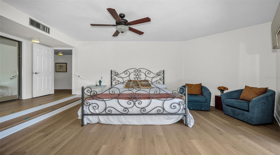 Large Master Suite With Huge Closet And En Suite Bath And Sliding Door To The Back Yard.