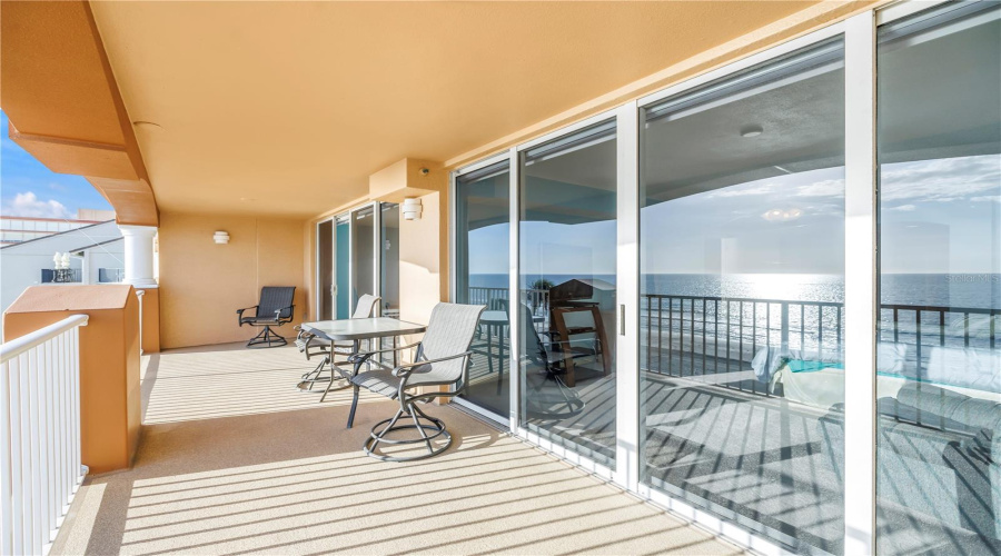 Large Balcony On The 4Th Floor, With One Set Of Sliders From Living Room And One Set From Primary Bedroom