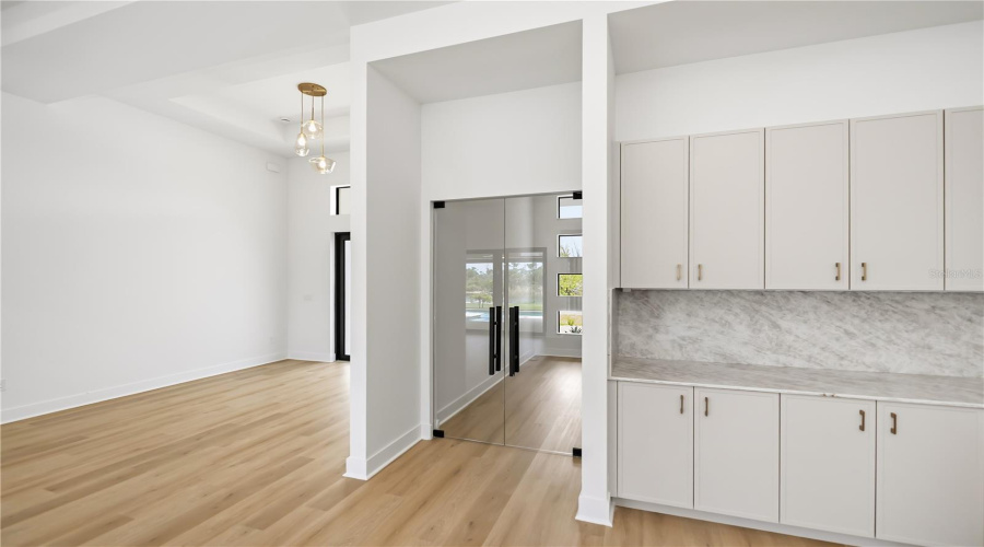 Executive Office Or Optional 5Th Bedroom With Custom Built-In Cabinetry.