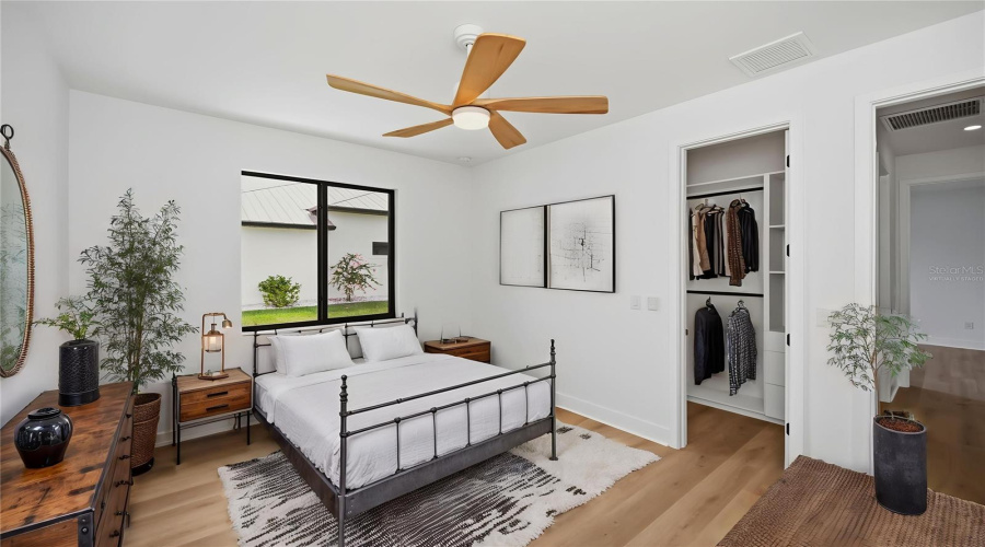 Virtually Staged Bedroom 2 With Walk-In Closet.