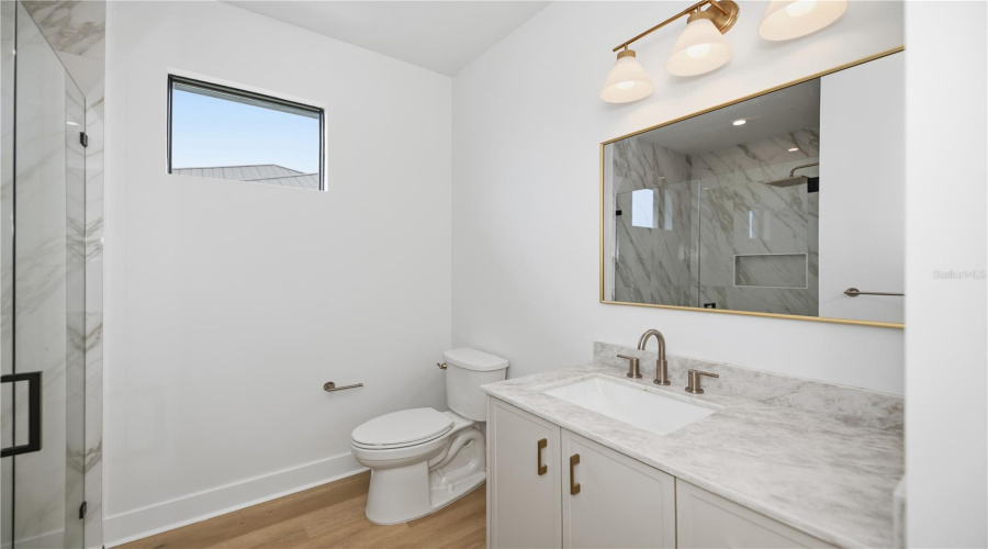 Bathroom 2 With Walk-In Shower And Designer Finishes.