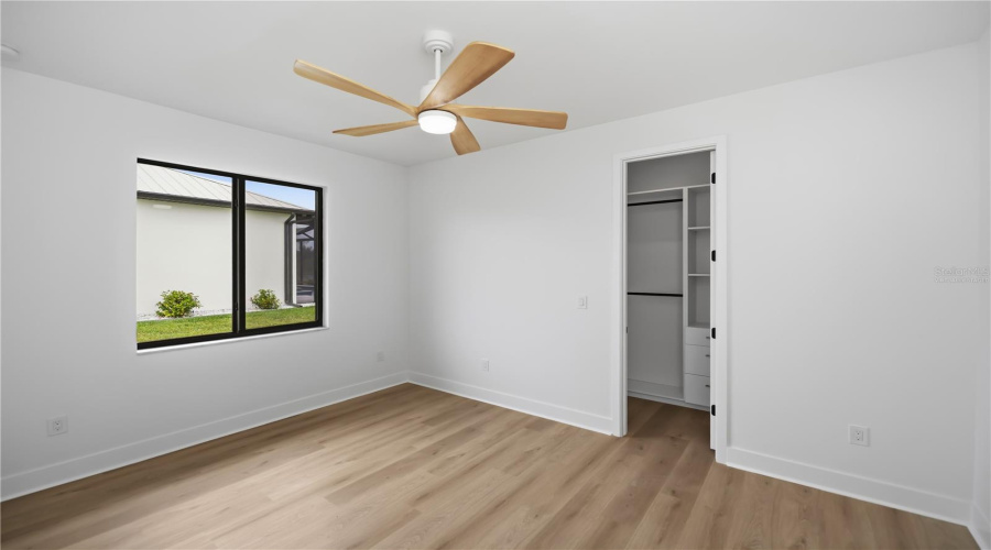Virtually Staged Third Bedroom With Walk-In Closet.