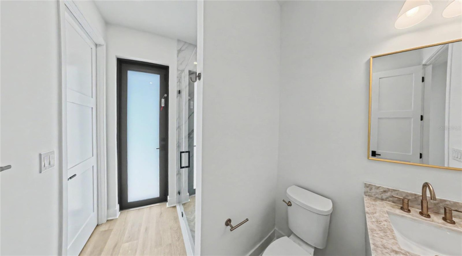 Guest Bathroom 3 With Full Shower And Access To And From Pool Area.