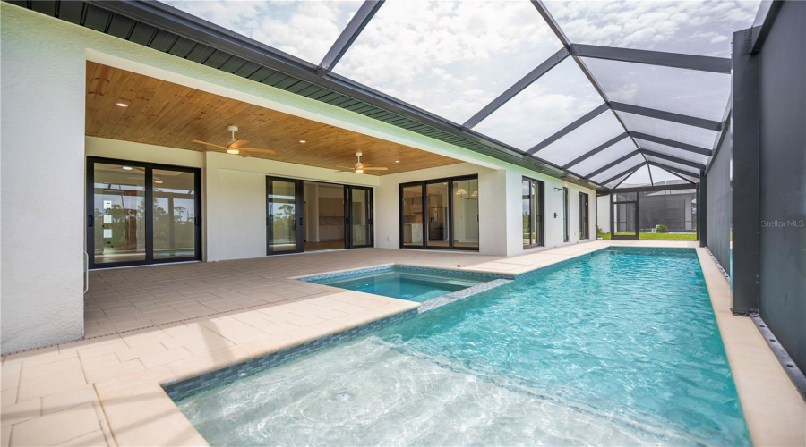 Expansive Screened Pool Overlooking Water Views.