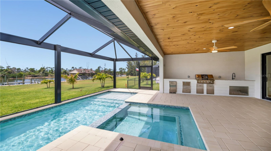 Expansive Screened Pool Overlooking Water Views.