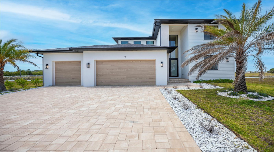 3-Car Garage Waterfront Luxury.