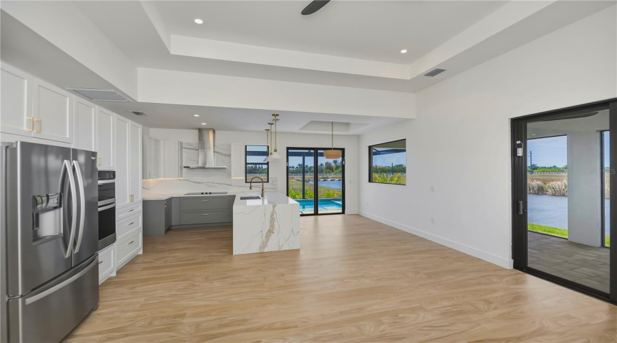 Modern Open Floor Plan With Tray Ceiling.