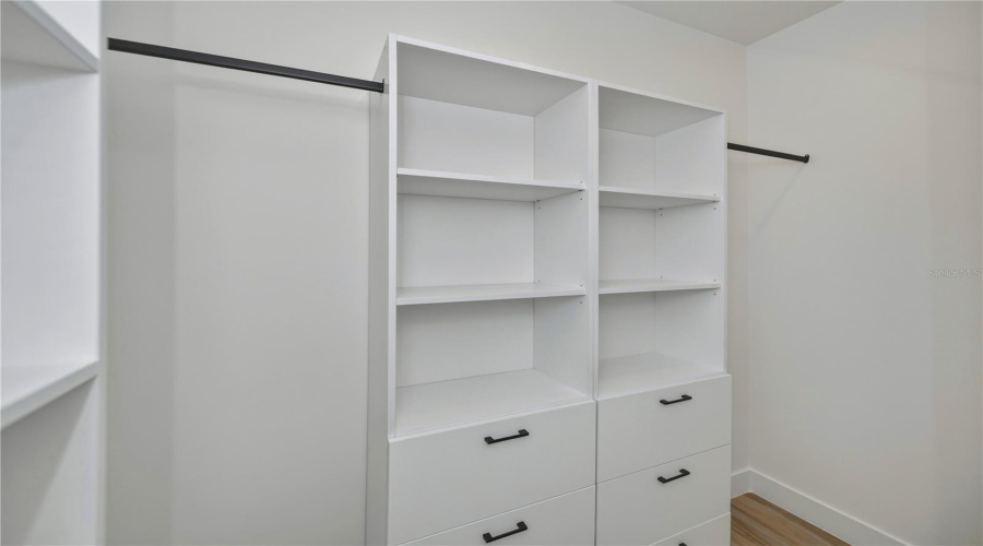 Primary Bedroom California Style Cabinety Walk In Closet