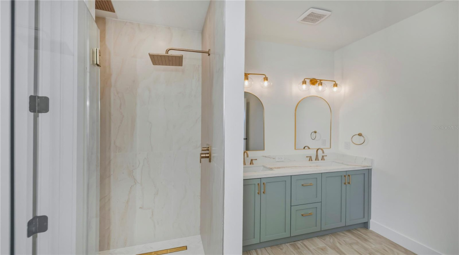 Primary Bathroom Suite With Glass Door Walk In Shower