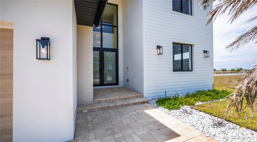 Soaring Tiered Glass Entryway.