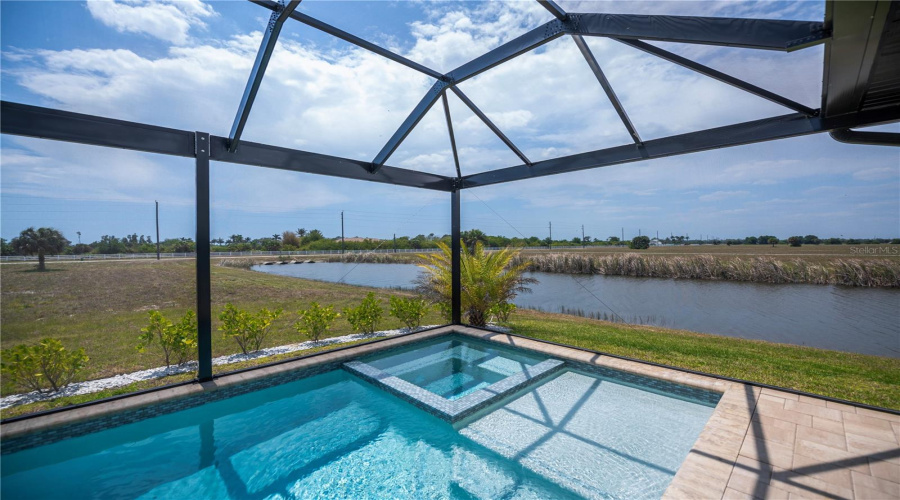Screened Pool And Spa With Panoramic Water Views.