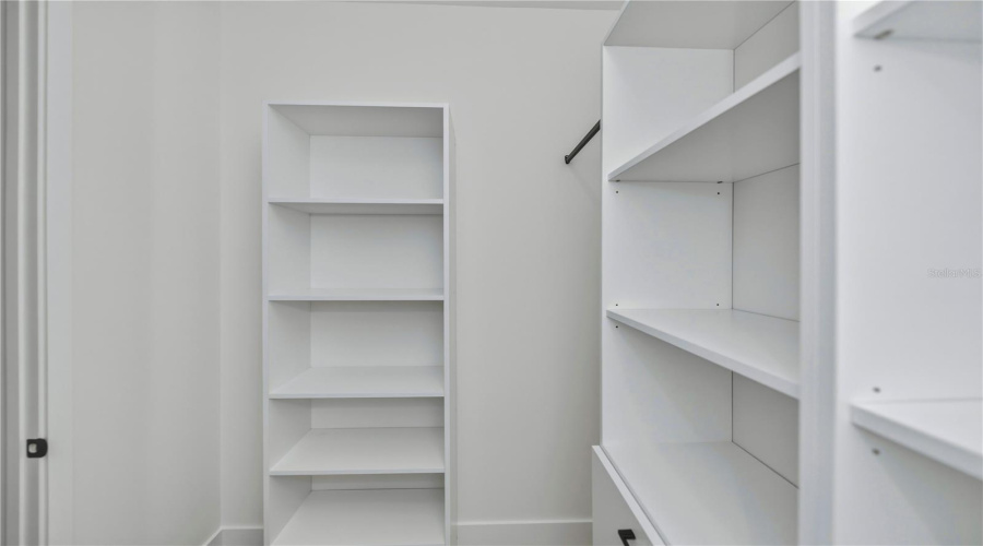 Primary Bedroom California Style Cabinety Walk In Closet