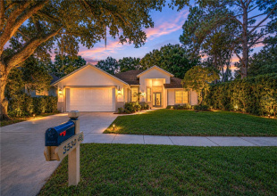 Beautifully updated residence in the gated River Hills community.