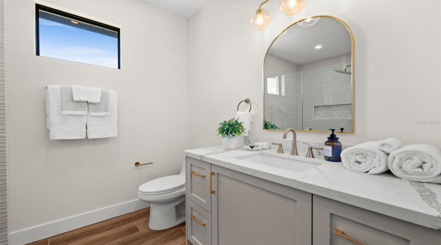 Guest Bathroom With Quartz Vanity.