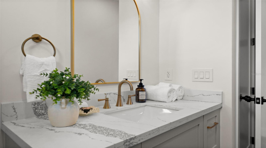 Guest Bathroom With Quartz Vanity.