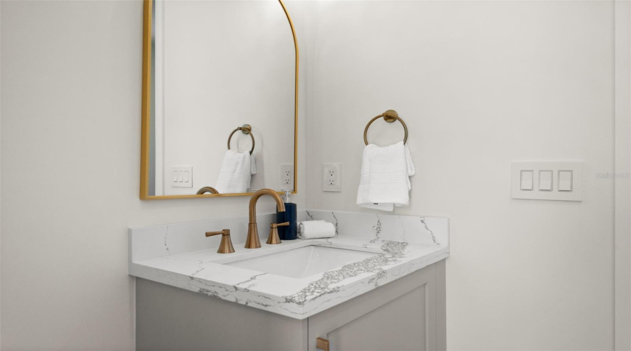 Third Bathroom Has Quartz Vanity.