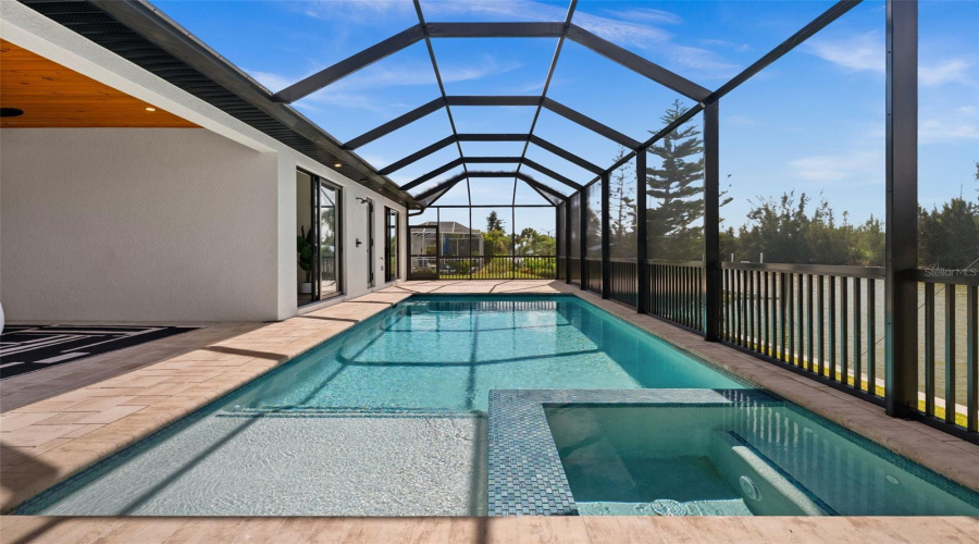 Resort Style Pool And Spa With Water Views.