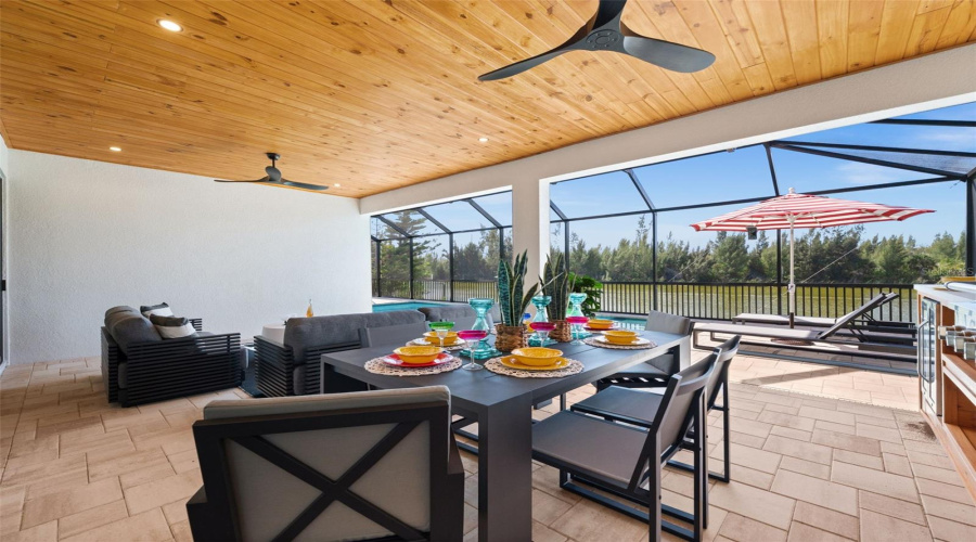 Covered Outdoor Living And Dining Area.