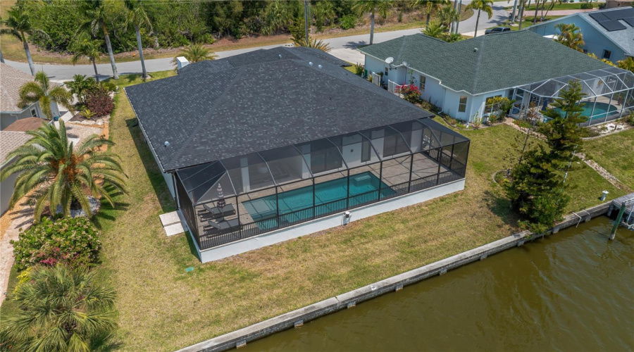 Concrete Seawall And Screen Pool Enclosure.