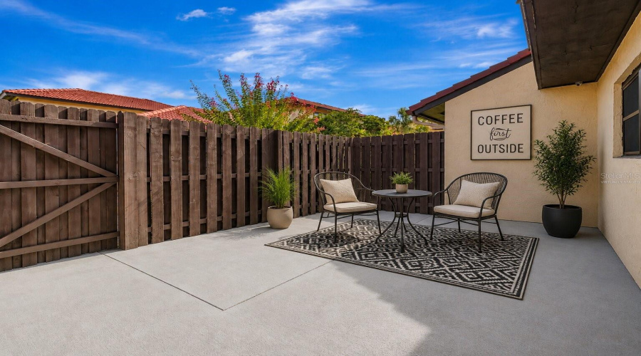 Virtually Staged Fenced Outdoor Patio Area
