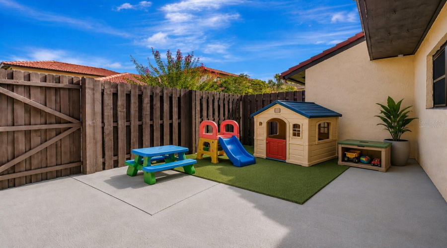 Virtually Staged Fenced Outdoor Patio Area