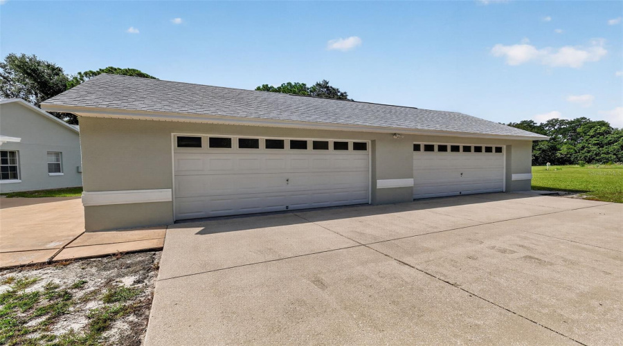 4-Car Garage And Workshop Space.