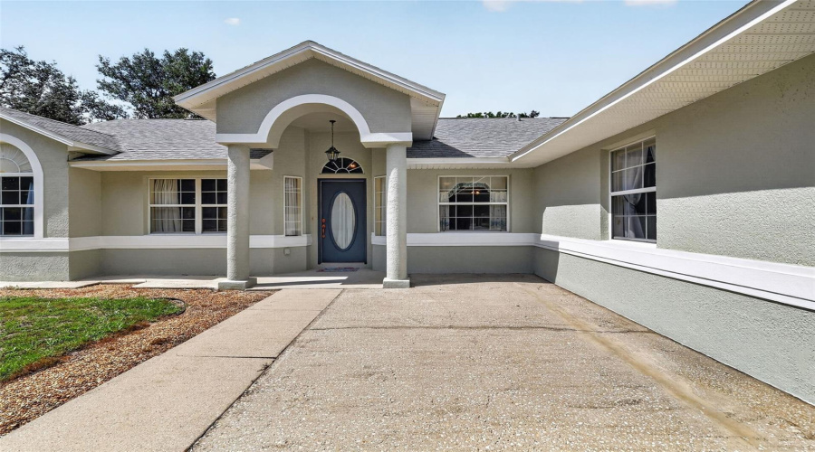 Front Patio And Covered Entry.