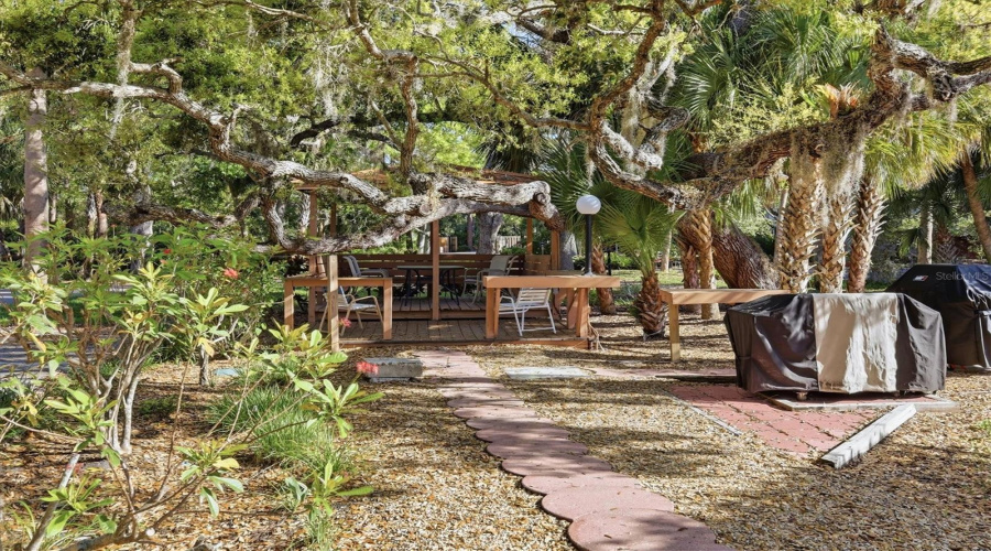 Picturesque Gazebo With Seating And Gas Grills