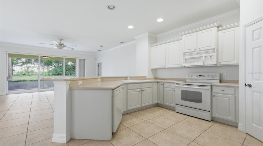 Kitchen Open To Living Space With Breakfast Bar