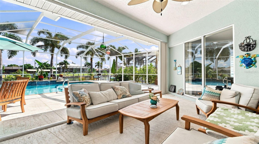 Covered Pool Area With Wide Water Views