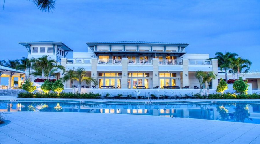 Main Clubhouse With Huge Pool And Restaurant And Gathering Spaces