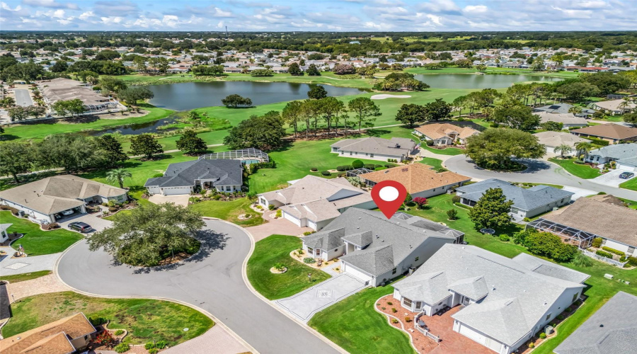 Aerial Perspective Highlights The Home’s Desirable Neighborhood Setting With Culdesac, Near Scenic Ponds On A Surrounding Championship Golf Course!