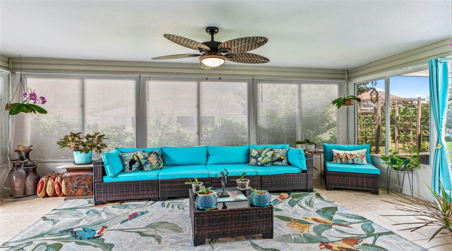 Bright Part-Enclosed Lanai (Complete W/ Its On Thermostat And Ac/Heat Ventalation With Choice To Completely Enclose)Provides A Comfortable Year-Round Retreat With Expansive Screened Windows, A Ceiling Fan, And Plenty Of Room For Lounging And Entertaining.