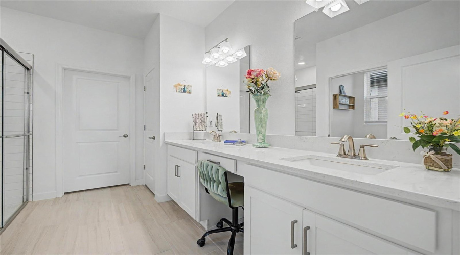 Large Primary En-Suite With Dual Sinks And Quartz Countertops
