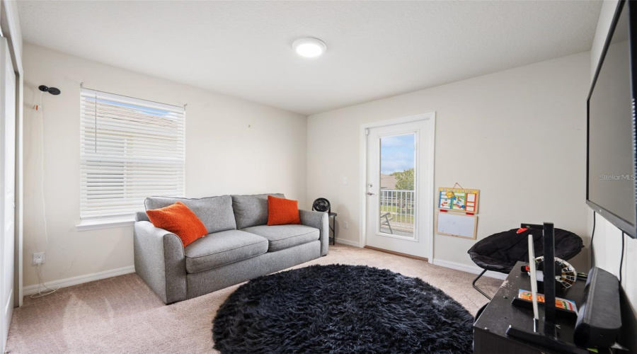 Third Bedroom That Can Be Used An An Office With The Balcony Attached To The Bedroom.