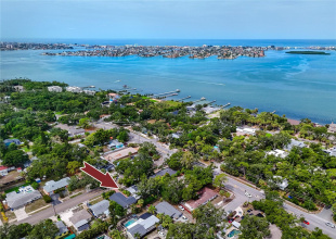 JUNGLE TERRACE - TWO Attached Homes on ONE Lot! Location close to beaches and X Flood Zone (low risk per FEMA)