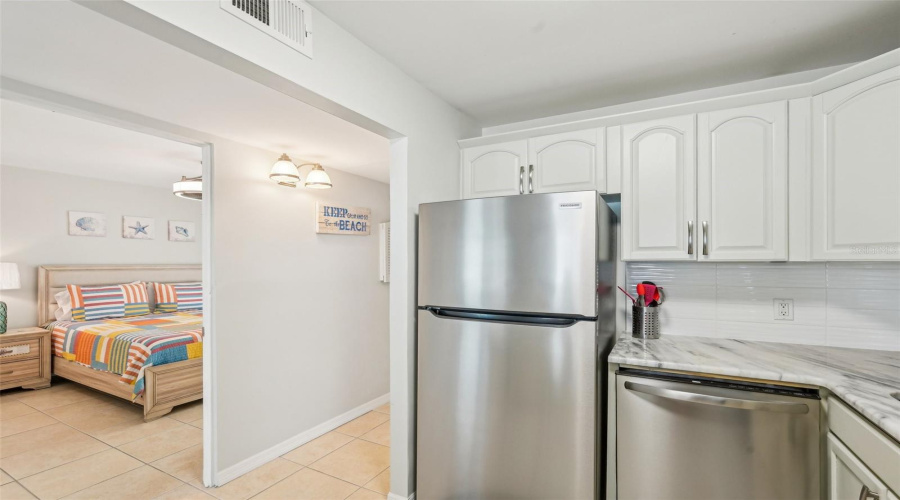 Efficient Kitchen Layout With Storage And Prep Space