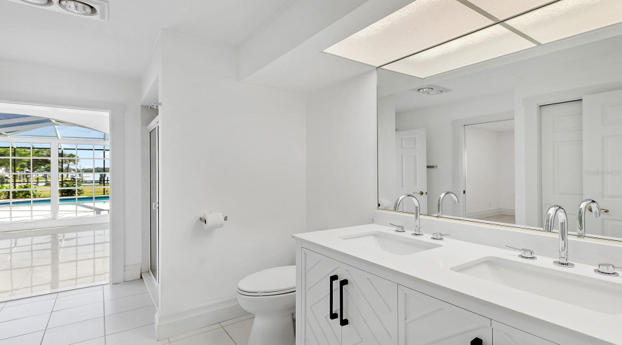 Double Sink Vanities In Both Bathrooms