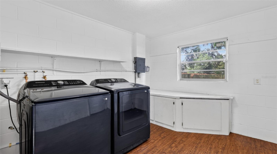 Nice Sized Utility/Laundry Room With Built-In Cabinetry And Storage-Samsung Washer And Dryer Included!