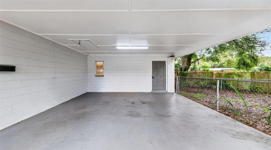 Nice Covered Carport With Convenient Side Entry To The Home