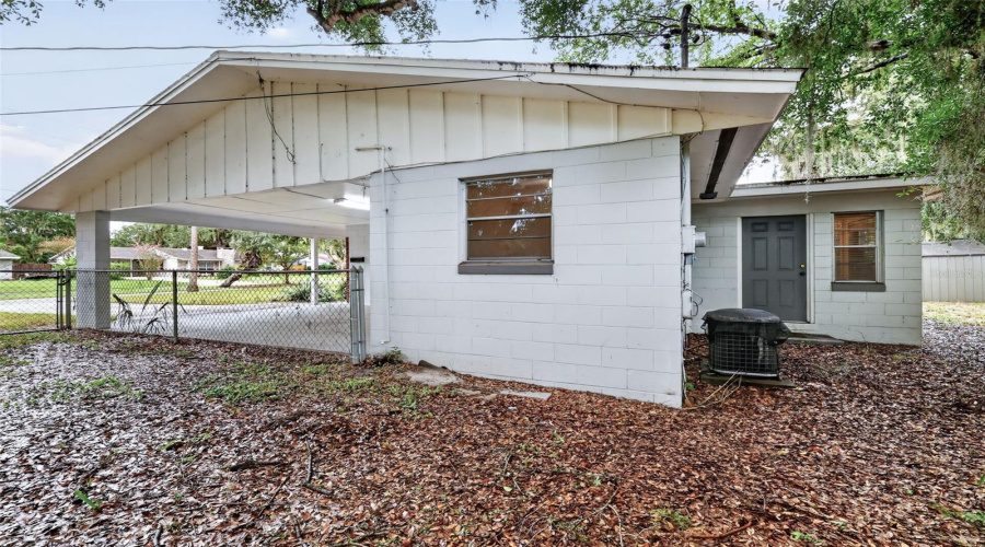 Exterior Side View Of The Home/Covered Carport