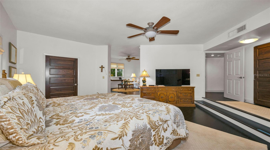 Master Bedroom Entrance Showing The Walk In Closet To The Left And The Additional 10' Closet To Your Right. In The Distance Is The Private Sitting Room Which Can Be A Third Bedroom Again Or Den/Office.