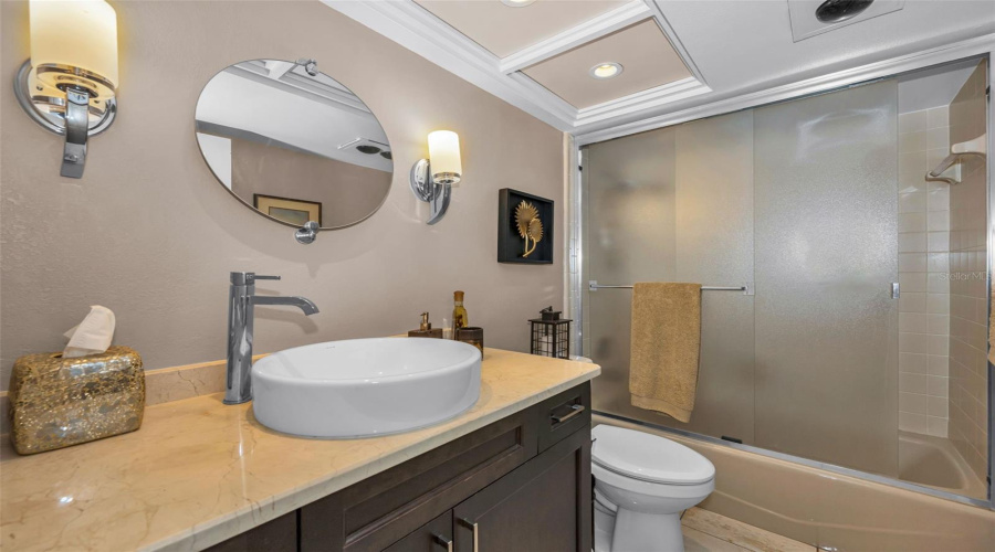 The Beautiful Hall Bath With A Tub Shower Combination!