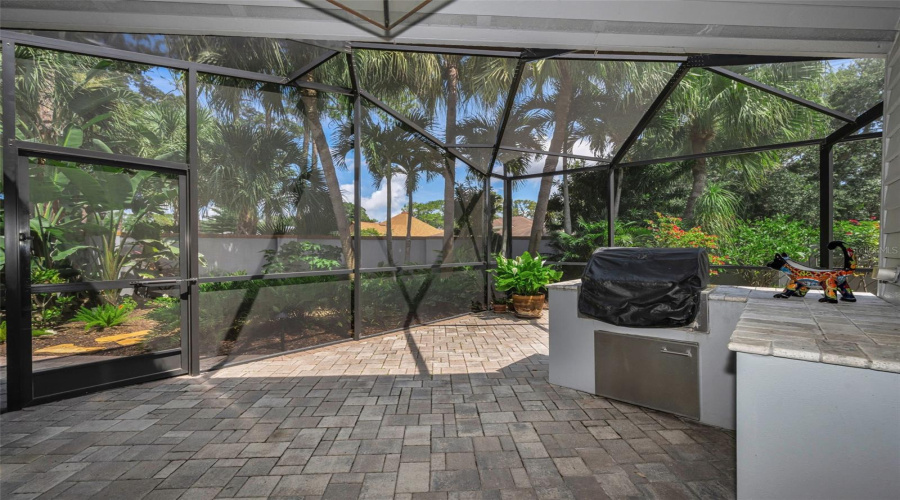 Screened Lanai Wraps Around 2 Sides Of The Home And Has A Gas Grill And Lots Of Room To Enjoy The Pond View...